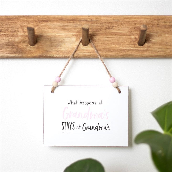 What Happens At Grandma's Hanging Sign